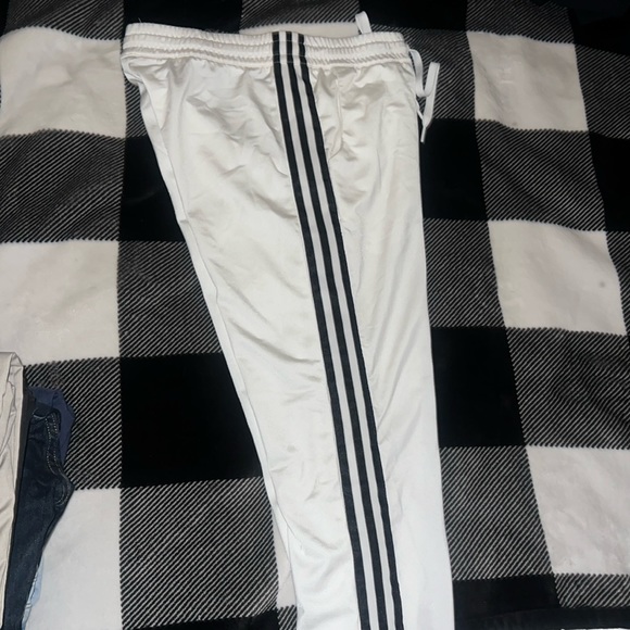 White Adidas track pants with black stripes. - Picture 3 of 3